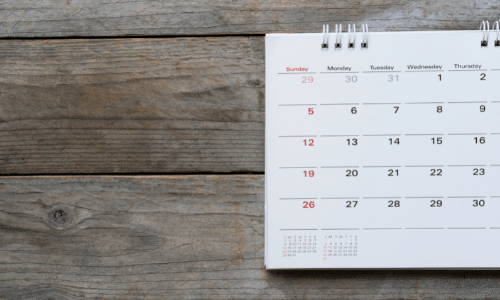 Calendar on Wooden Table